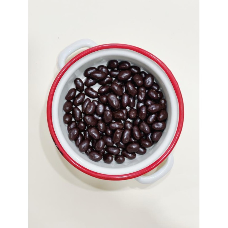 PISTACHO BAÑADO CHOCO NEGRO